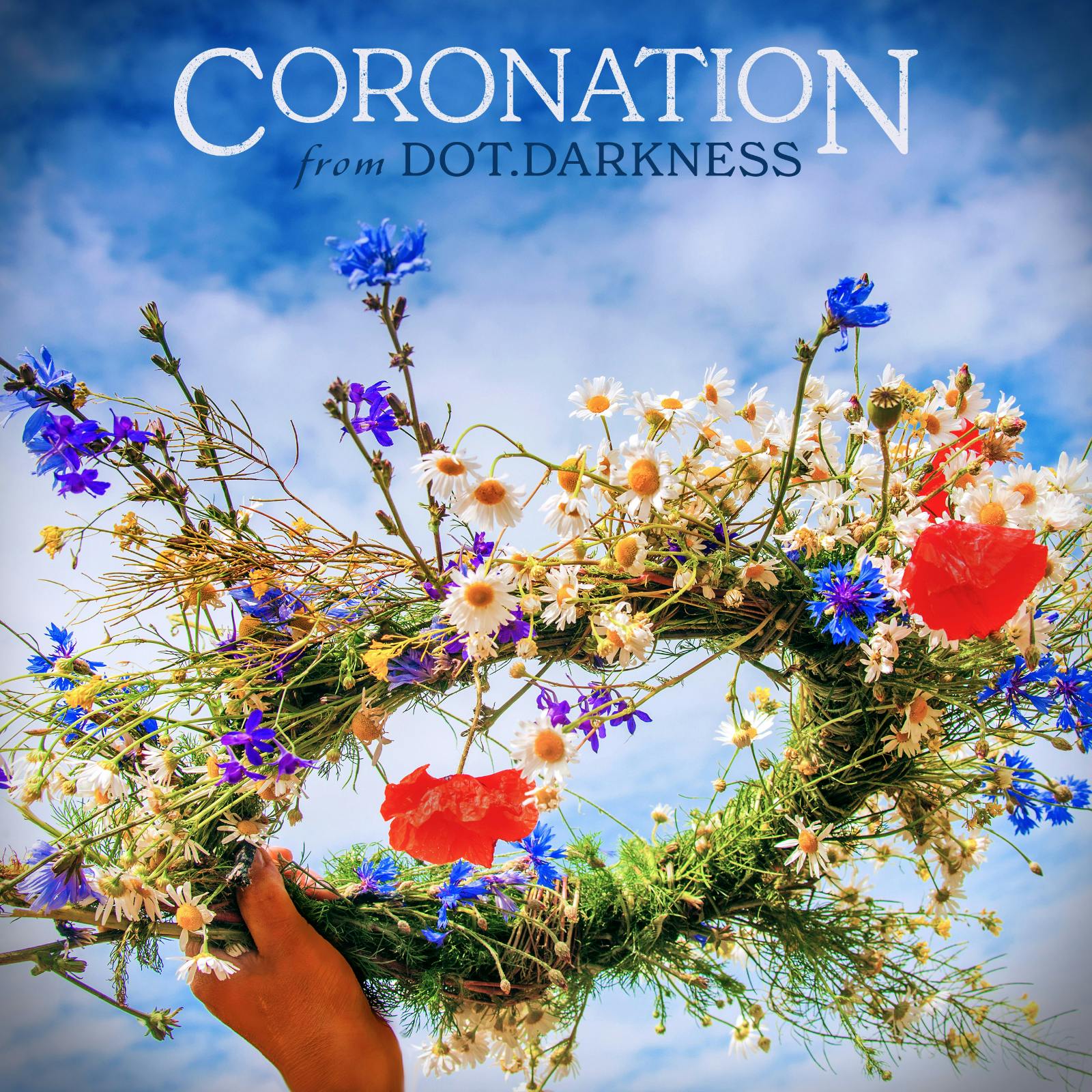 Artwork for Coronation by dot.darkness. A hand holds up a floral crown constructed with bright green, white, red, and indigo flowers against a cloudy blue sky.